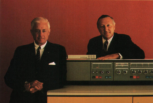 IBM chairman and president with an IBM 360 computer, circa 1970