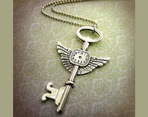 Vintage Silver Flying Key