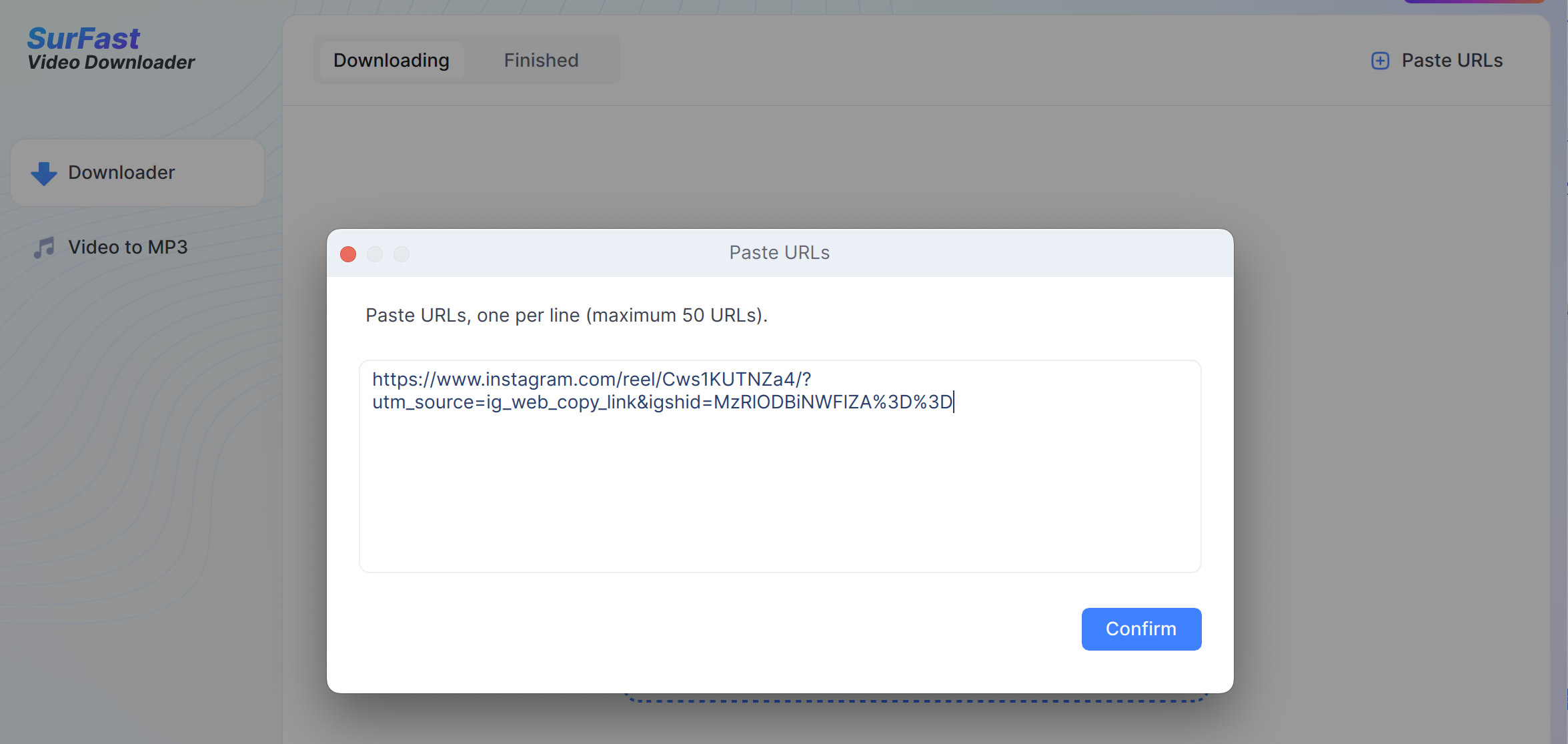 Pasting URL in SurFast Video Downloader and confirming