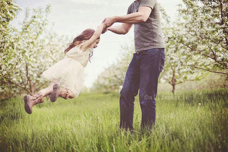 Father Posing With Cute Baby Daughter On Grunge Background Stock Photo,  Picture and Royalty Free Image. Image 110391009.