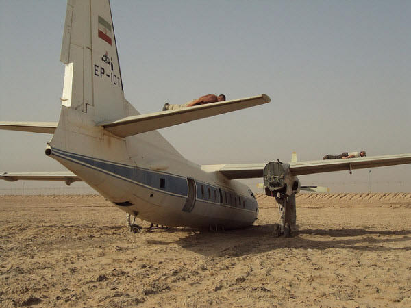 Daring individual planking on an aeroplane's wing